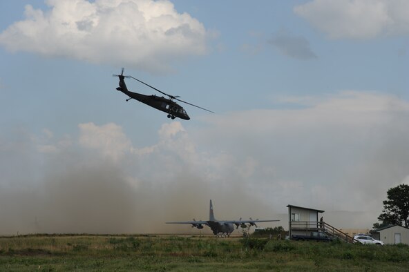 A UH-60 Black Hawk takes off during Exercise Global Medic July 17, 2013, from Fort McCoy, Wis. Global Medic is an annual joint-Reserve field-training exercise designed to replicate all facets of combat theater aeromedical evacuation support. (U.S. Air Force photo/Master Sgt. Roy Santana)