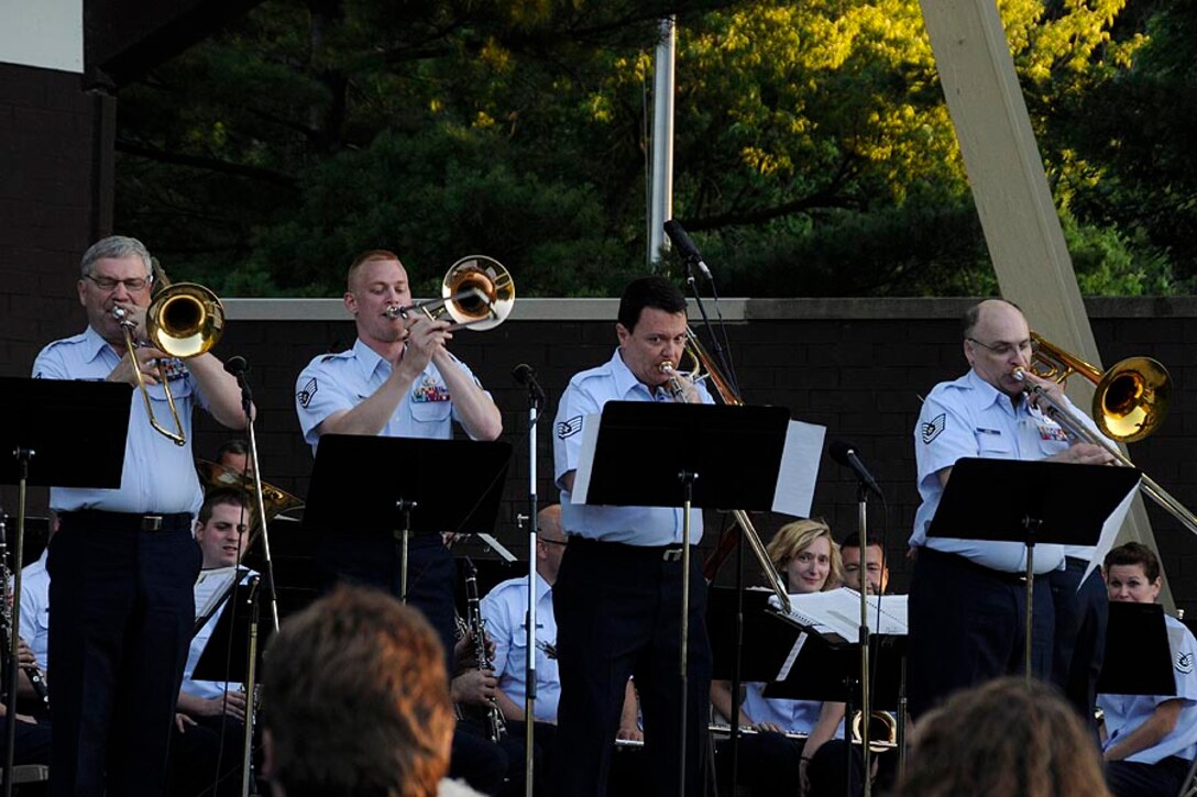 Trombonists TSgt Stromski, SSgt Dieringer, SSgt Roberts, and TSgt Dunn wow the crowd with TSgt Dunn's arrangment of "76 Trombones".

Photo courtesy of TSgt Todd Pendleton, 182nd AW