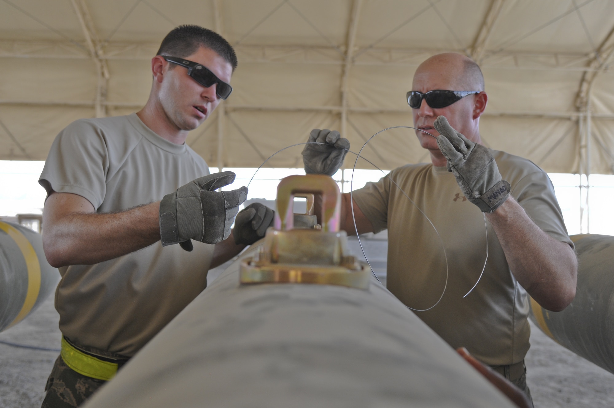A FMU-152 tail fuze, which is used to arm multiple munitions types at the temporary munitions storage area with the 380th Expeditionary Maintenance Squadron’s munitions flight. Pilots took a tour of the temporary munitions storage area July 15, 2013, in the hopes of gaining more knowledge of what goes into building munitions. (U.S. Air Force photo by Senior Airman Jacob Morgan)