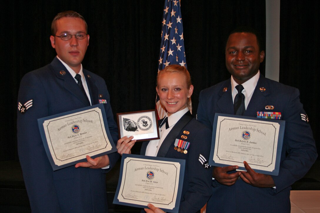 Senior Airman Marc Bernier, 14th Operations Support Squadron, Senior Airman
Eva Gaus, 14th Civil Engineer Squadron, and Senior Airman Kelvin Jordan,
14th Operations Support Squadron, pause for a photo at the Airman Leadership
School graduation ceremony July 11 held on Maxwell Air Force Base, Ala. ALS
is a five-week long professional military education course that arms senior
airmen with the skills and knowledge needed to perform as front-line
supervisors in the Air Force. Gaus was the recipient of the Commandant's
Award. 