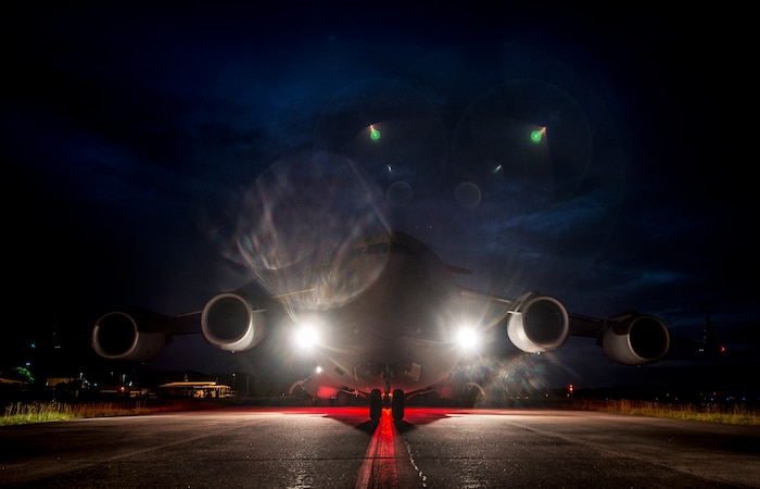 A C-17 Globemaster III taxis to the runway before taking off to perform “touch and goes” July 17, 2013, at Joint Base Charleston – Air Base, S.C. Airmen from the 437th Airlift Wing work around the clock on the flightline to provide combat-ready C-17A aircrews, mission support personnel and processes for 53 assigned aircraft to meet White House, Department of State and Joint Chiefs of Staff-directed global deployment, employment and resupply of Department of Defense and allied forces via air-land and airdrop operations. (U.S. Air Force photo/ Senior Airman Dennis Sloan)