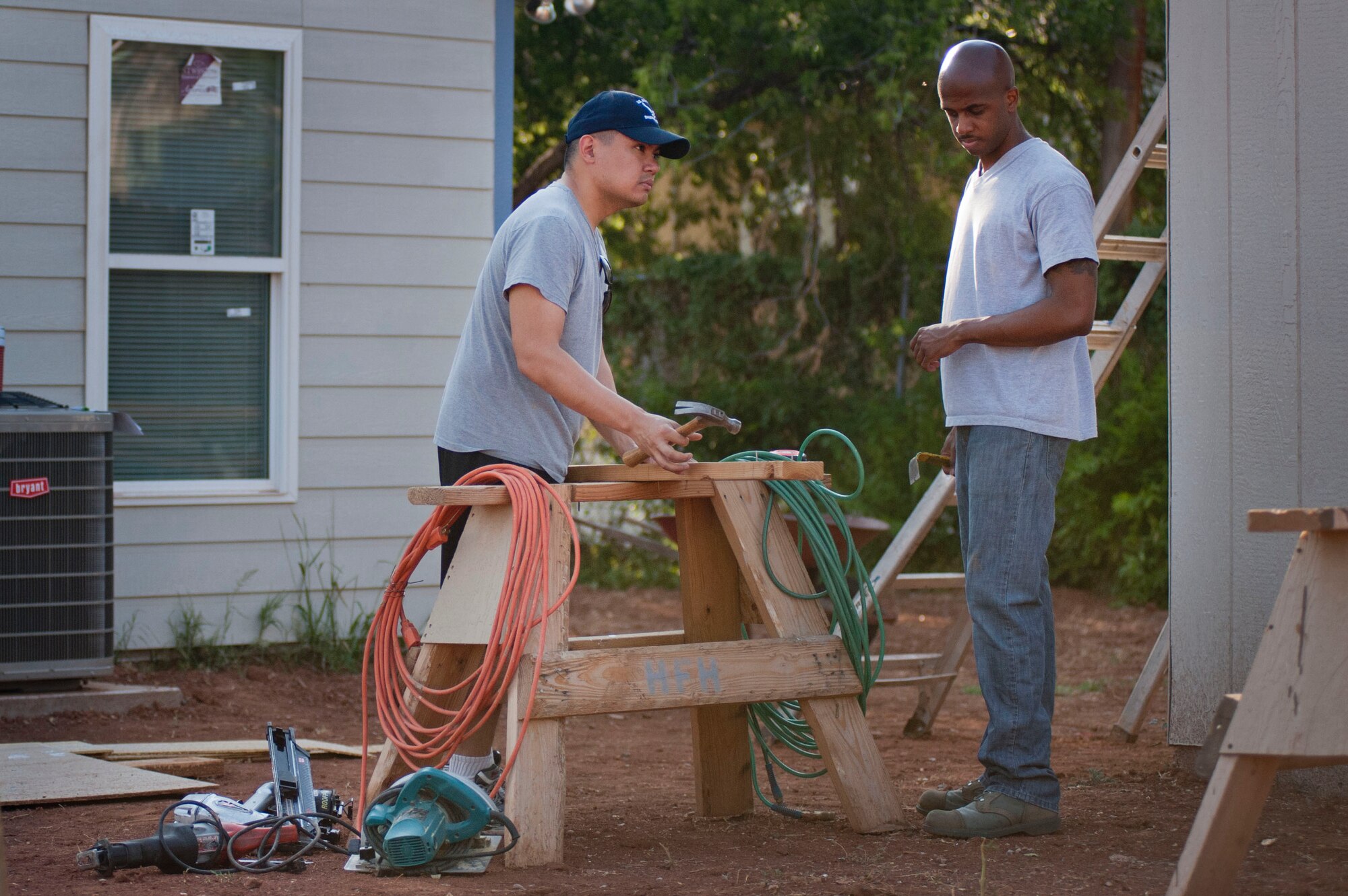 Volunteers from Sheppard assisted Wichita Falls Habitat for Humanity in constructing new homes for residents July 13. One of the organizations primary objectives is to give underprivileged residents new affordable homes.  (U.S. Air Force photo by Airman 1st Class Jelani Gibson) 