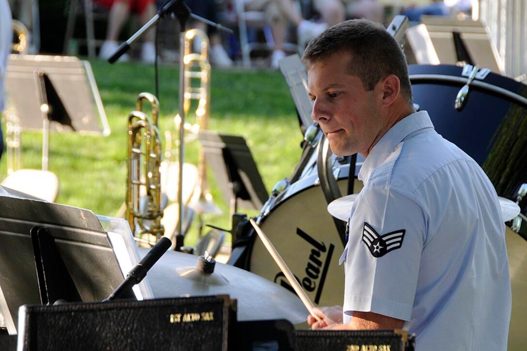 SrA Justin Ahlberg plays the drum set with Harmony in Blue.


Photo courtesy of TSgt Todd Pendleton, 182nd AW Public Affairs