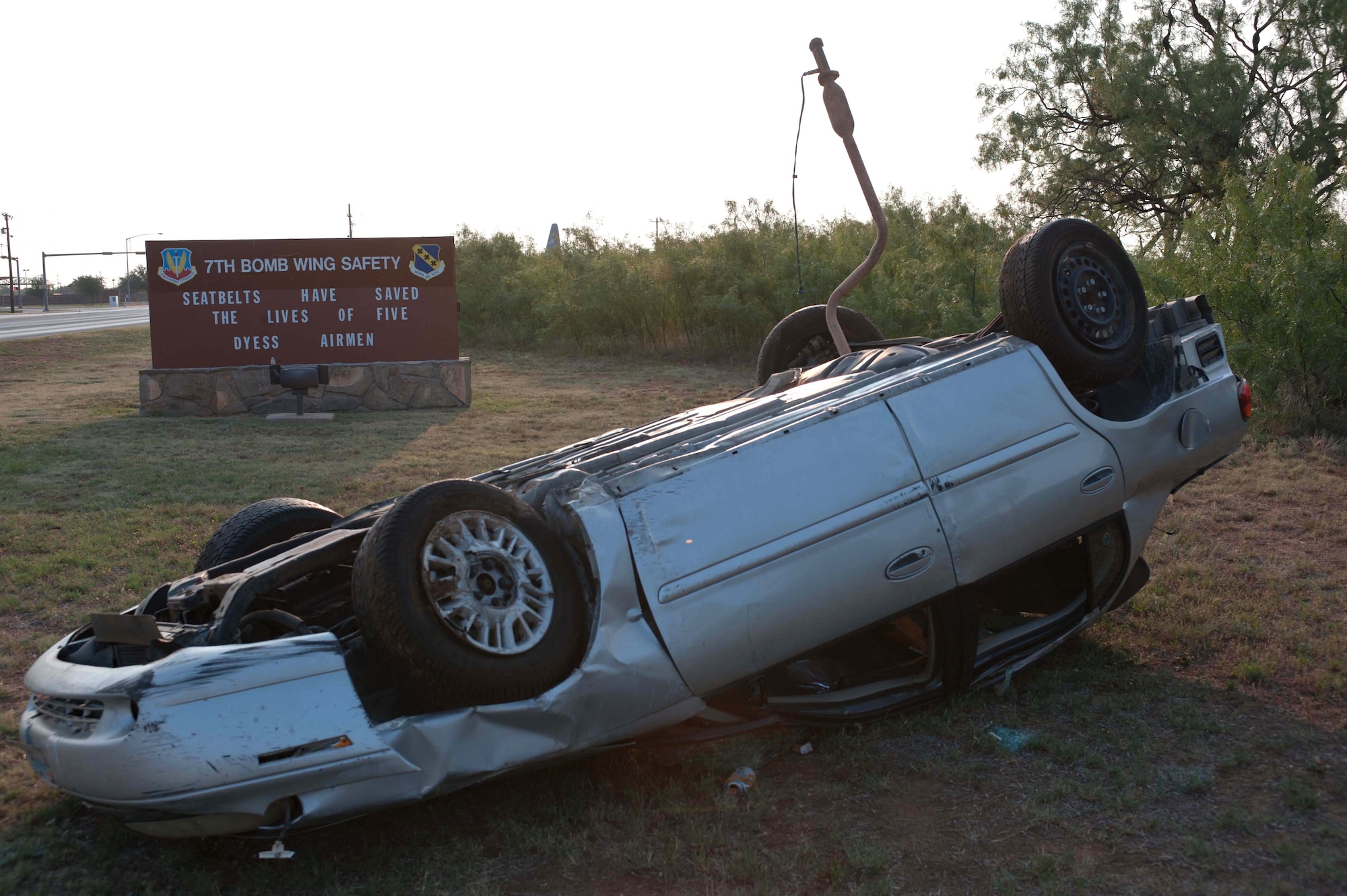 The 7th Bomb Wing Ground Safety office recently placed a vehicle upside down on Dyess Air Force Base, Texas, to raise awareness of seat belt safety during the 101 Critical Days of Summer. It is every Airman’s responsibility to ensure their passengers including themselves are wearing a seat belt while riding in their motor vehicle. (U.S. Air Force photo by Airman 1st Class Kylsee Wisseman/Released) 
