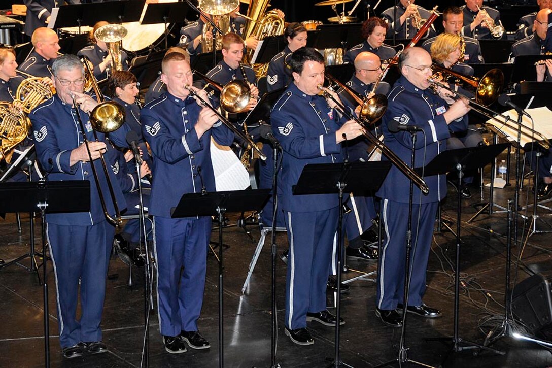 Trombonists TSgt Stromski, SSgt Dieringer, SSgt Roberts, and TSgt Dunn wow the crowd with TSgt Dunn's arrangment of "76 Trombones". 

Photo courtesy of TSgt Todd Pendleton, 182nd AW Public Affairs