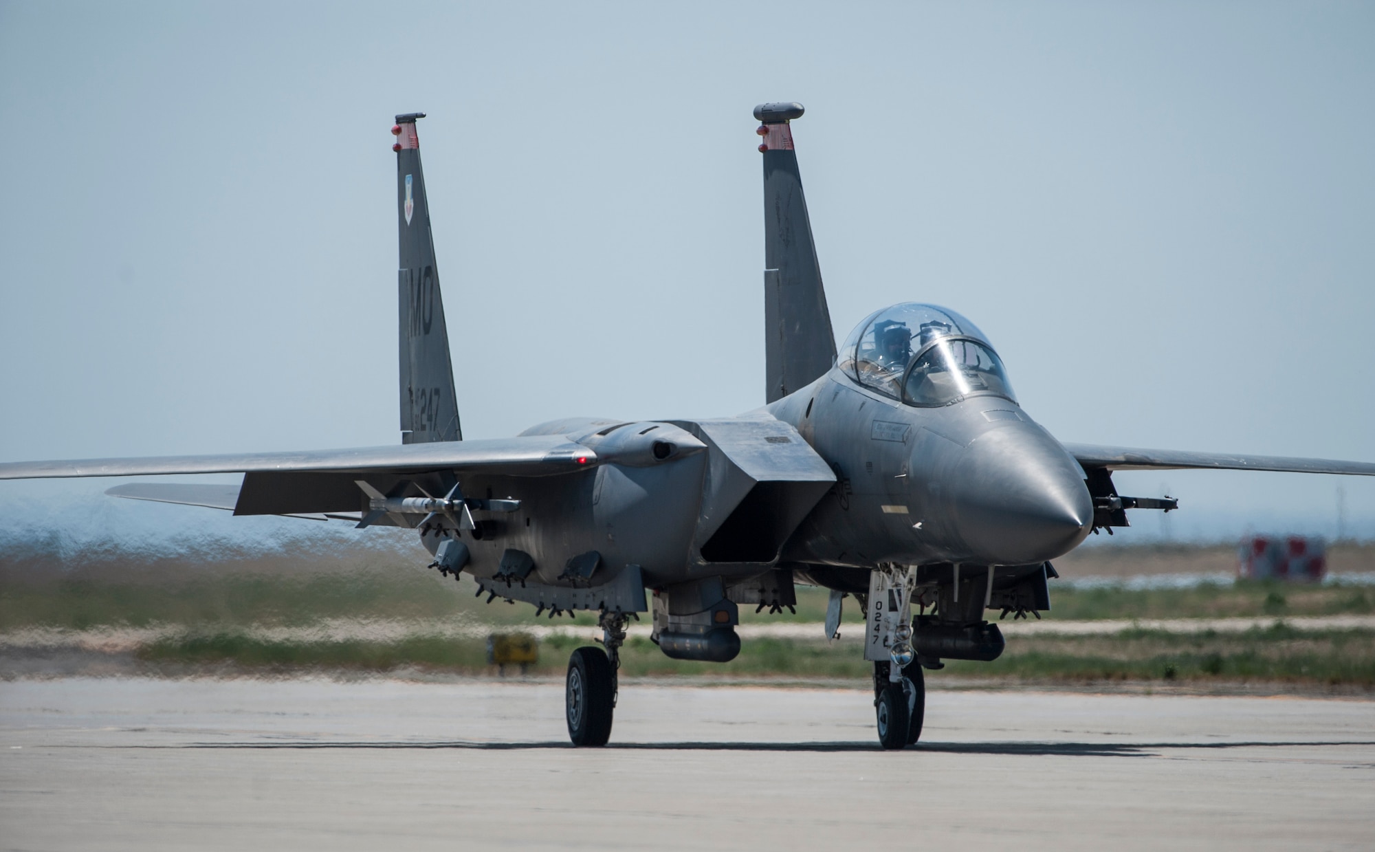 A U.S. Air Force F-15E Strike Eagle belonging to the 391st Fighter Squadron taxis to the runway July 17, 2013, at Mountain Home Air Force Base, Idaho. 391st FS pilots and weapons systems officers returned to flying operations after being grounded for approximately three months due to budget constraints. (U.S. Air Force photo by Airman 1st Class Brittany A. Chase)