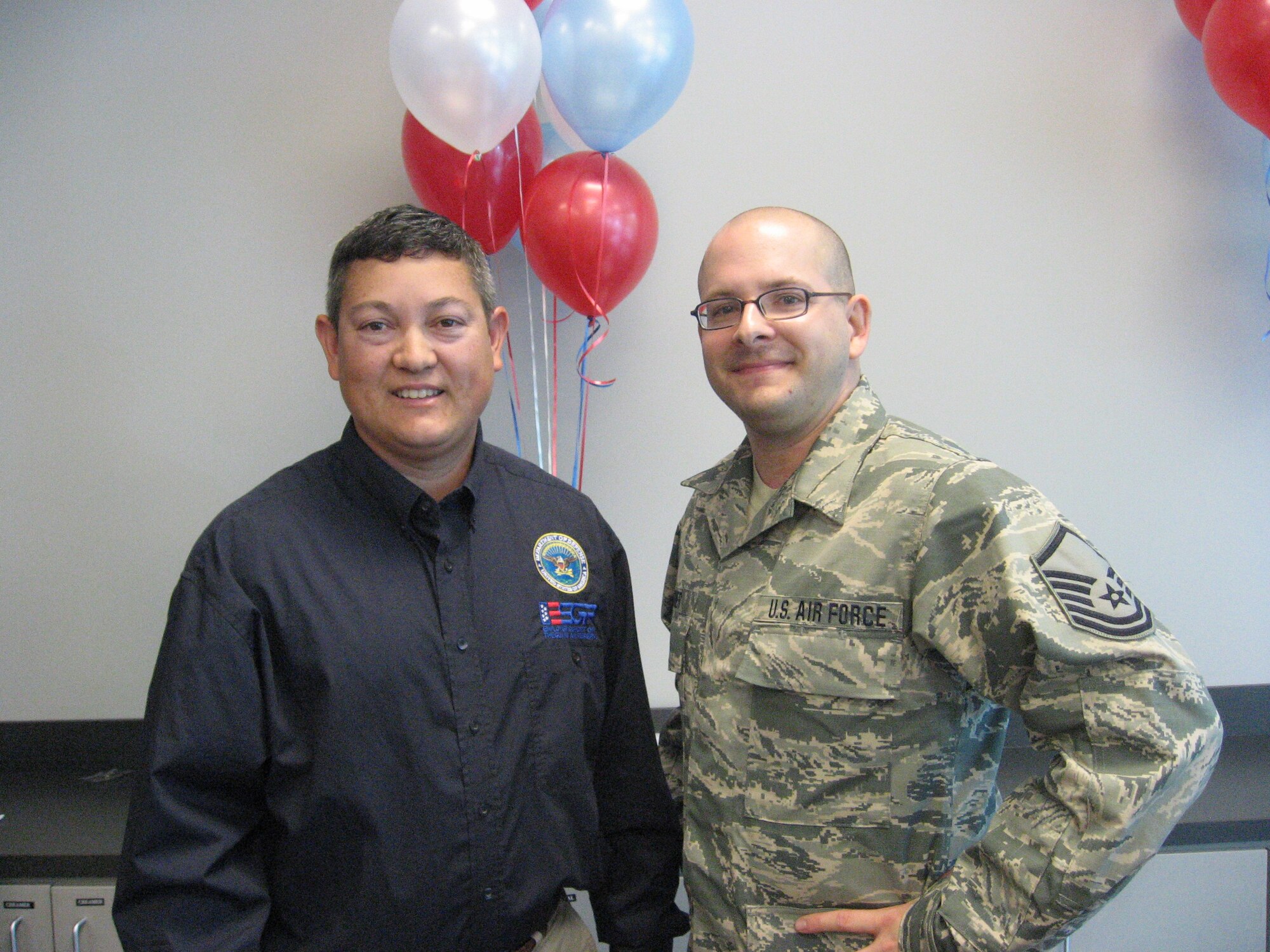 Master Sgt. Jon Surginer of the 188th Aircraft Maintenance Squadron, right, poses for a photo with Master Sgt. Brian Anible, 188th Mission Support Group 1st Sgt and Arkansas Committee for Employer Support of the Guard and Reserve volunteer. Surginer nominated his civilian employer, Arvest Mortgage, for the ESGR Seven Seals Award. The Seven Seals Award is the broadest and most inclusive award given by ESGR. It is presented at both the state and national levels to honor significant individual or organizational achievement, initiative, or support that promotes and supports the ESGR mission, to include the efforts of the more than 4,900 volunteers who carry out ESGR’s mission across the nation on a daily basis. (courtesy photo)
