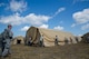 Airmen assemble and move an Utilis Compact TM60 Tall tent in preparation for Exercise Global Medic July 16, 2013. Global Medic is an annual joint-Reserve field-training exercise designed to replicate all facets of combat theater aeromedical evacuation support. (U.S. Air Force photo/Staff Sgt. Heather Cozad)