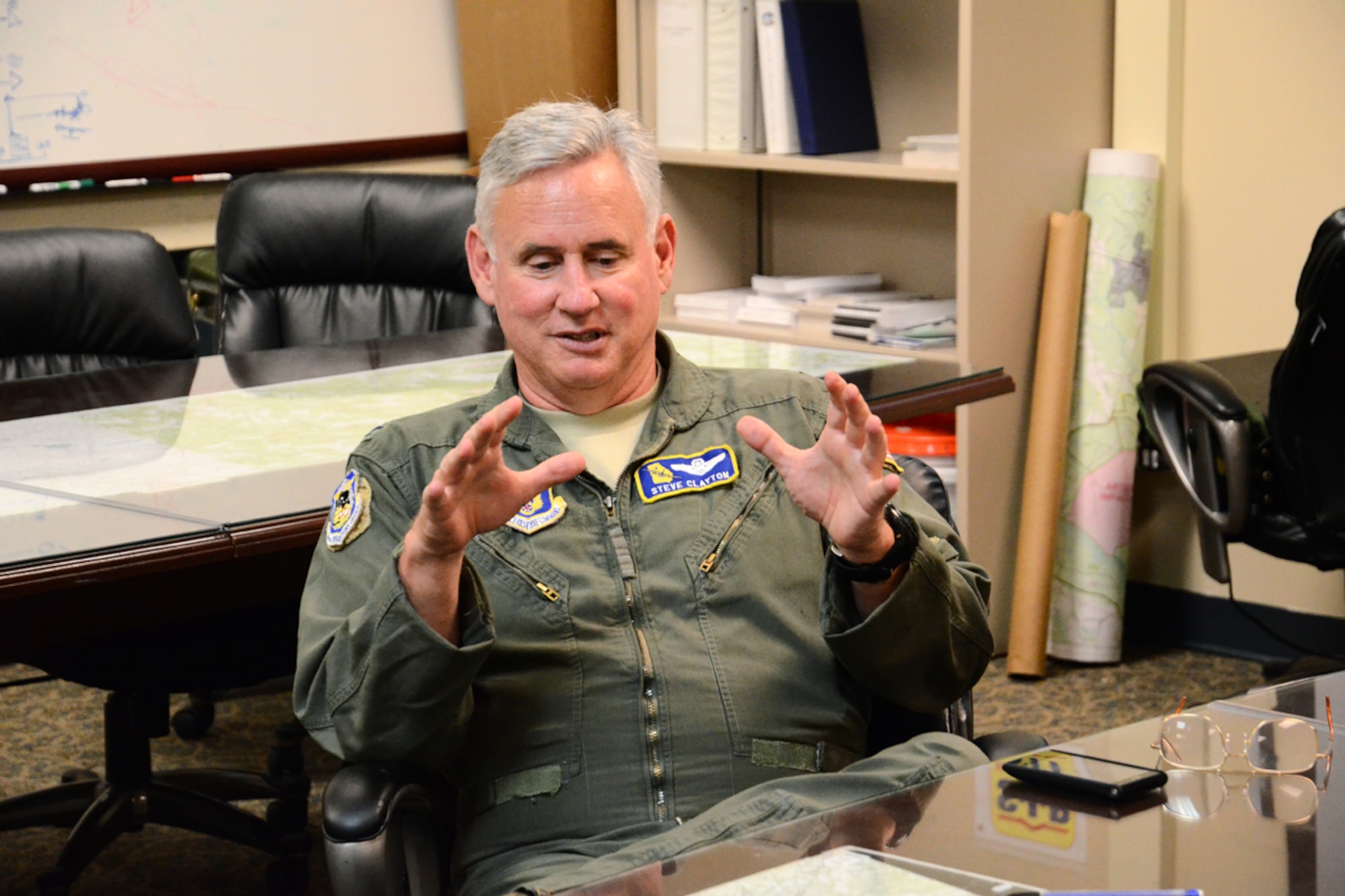 Col. Steven Clayton, 94th Operations Group commander participates in a safety briefing with aircrew prior to his fini-flight June 18. Col Clayton is retiring after 30 years of service and over 5,800 flight hours in the U.S. Air Force. (U.S. Air Force photo/ Brad Fallin)