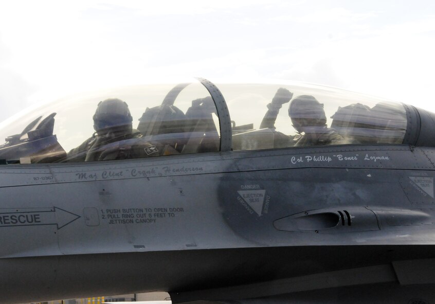 Col. Donald R. Lindberg, 10th Air Force vice commander, and Chief Master Sgt. Cameron B. Kirksey, Air Force Reserve Command command chief master sergeant, taxi to the flightline for Kirksey’s F-16 familiarization flight with Lindberg at Homestead Air Reserve Base, Fla., July 12. (U.S. Air Force photo/Senior Airman Jaimi Upthegrove)