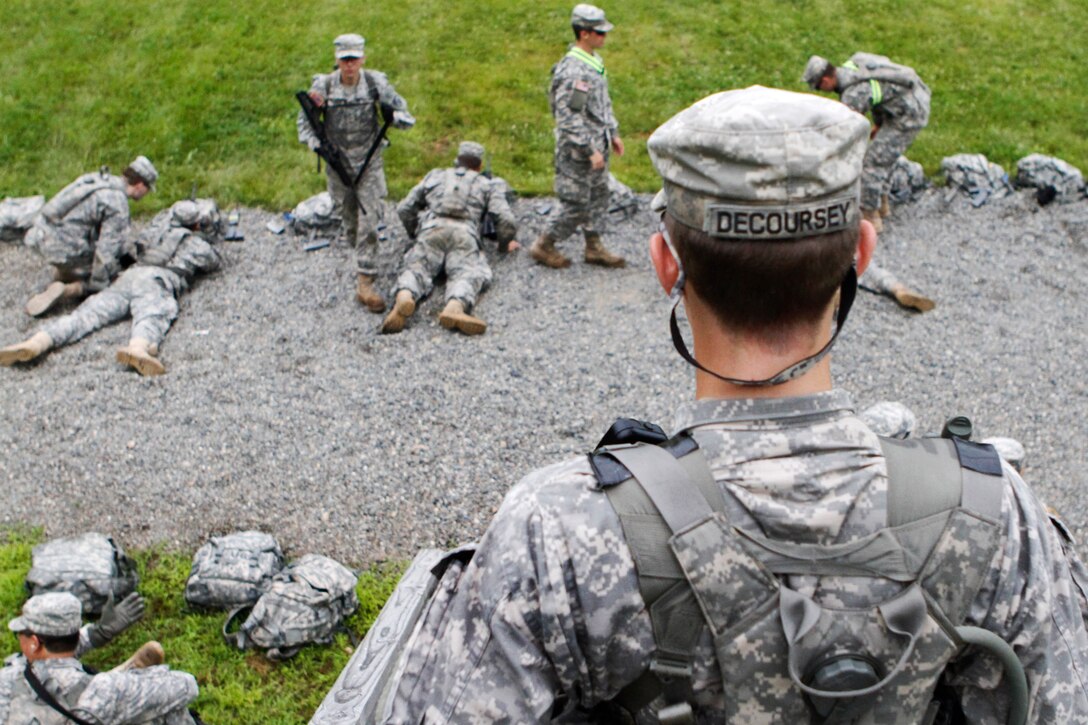 An Army cadet splashes into the water after releasing from a cable during a field training exercise on Camp Buckner at the U.S. Military Academy at West Point, N.Y., July 10, 2013.