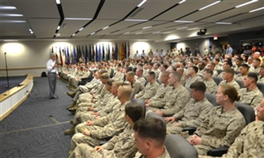 Secretary of Defense Chuck Hagel talks to members of the Marine Special Operations Command at Camp Lejeune, N.C., on July 17, 2013.  Hagel is visiting Marine units in the Jacksonville, N.C., area to conduct town hall meetings and receive briefings from Marine Corp and civilian leaders on the impact of furloughs and sequestration on their lives and operations.  