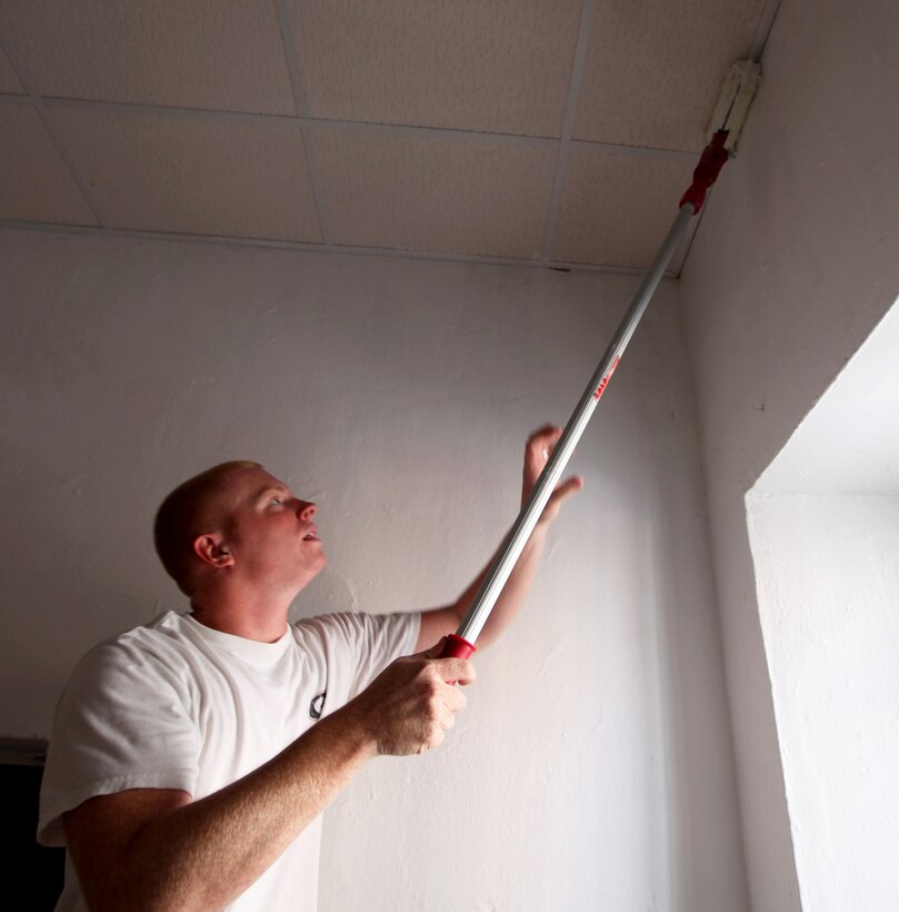 Special-Purpose Marine Air-Ground Task Force Crisis Response helps to repair a wall in the sanctuary of Saint Francis of Assisi Parish in Moron De La Frontera, Spain, May 24, 2013. The project, which began in May and was completed in July, took more than 700 man-hours to complete and renovated locations within the parish, including a classroom for school-aged children, a preparation chamber, a food pantry and the sanctuary. The parish was established in 1756 and required painting scraping and some surface work on many of its walls. The work was performed at no cost to the parish or the Marine Corps, but with volunteer donations and service from personnel supporting SP-MAGTF CR. SP-MAGTF Crisis Response is a rotational force of Marines and sailors sourced from a variety of units from II Marine Expeditionary Force, Camp Lejeune, N.C., temporarily positioned on Moron Air Base, Spain, capable of decisive action across a range of military operations.. 