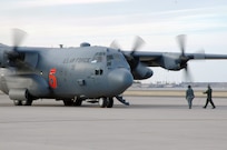 A Modular Airborne Firefighting System-equipped C-130 assigned to the 302nd Airlift Wing prepares for take-off at Peterson Air Force Base, Colo., April 16. The aircraft is one of two MAFFS-equipped aircraft assigned to assist the Mexican government in fighting wildland fires in Northern Mexico. The MAFFS unit, which is owned and maintained by the U.S. Forest Service, is a pressurized self-contained firefighting system designed for installation in C-130 aircraft without structural modifications to the aircraft.  The system is designed to air-drop fire-retardant chemicals onto wildfires.  