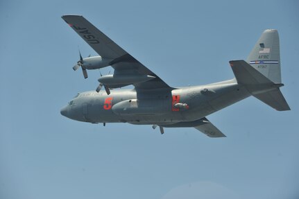 A C-130 from the 302nd Airlift Wing, Peterson Air Force Base, Colo., equipped with a U.S.D.A. Forest Service Modular Airborne Fire Fighting System flies toward a wildfire west of Austin, Texas, April 17, 2011.  Six MAFFS C-130s, deployed by US Northern Command to Texas, have conducted several aerial firefighting missions over the Texas fires in the past two days. 