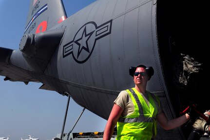 U.S. Air Force Staff Sgt. Shane Sturgeon fills up a C-130 Hercules's Modular Airborne Fire Fighting System aircraft with fire retardant before it departs here, April 17, 2011, to support firefighting against the wildfires in Texas.  Sergeant Sturgeon is a maintainer assigned to the 302nd Aircraft Maintenance Squadron out of Peterson AFB, Colo.  