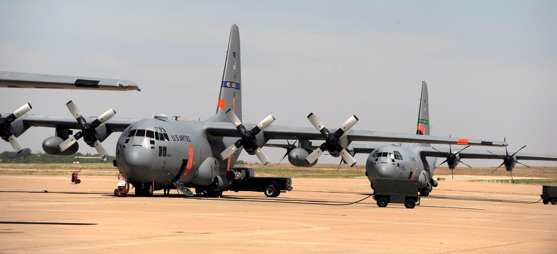 Airmen from California Air National Guard's 146th Airlift Wing, North Carolina Air National Guard's 145th Airlift Wing and Wyoming Air National Guard's 153rd Airlift Wing gather at Dyess Air Force Base, Texas to prepare for wildfire fighting operations, April 18, 2011.  The Airmen maintain and operate the Modular Airborne Firefighting System(MAFFS) housed aboard a C-130 Hercules which is capable of dispensing 3,000 gallons of water or fire retardant in under 5 seconds.  The wildfires have spread across various parts of Texas and have burned more than 1,000 square miles of land. 