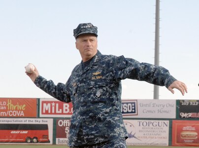 Navy Adm. James Winnefeld, North American Aerospace Defense Command and U.S. Northern Command commander, throws out the first pitch at the Sky Sox - Grizzlies game at Security Services Field May 3. The NORAD and USNORTHCOM commander also gave the oath of enlistment to 12 U.S. Navy enlistees. The Sky Sox beat the Grizzlies 13 - 5. 