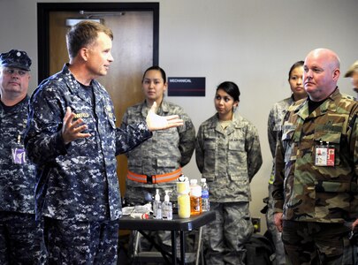 Navy Adm. James Winnefeld, North American Aerospace Defense Command and U.S. Northern Command commander, visits with participants of the National Level Exercise 2011 at Springfield-Branson National Airport in Springfield, Mo., May 18.  Winnefeld spoke with the participants of NLE to ensure that the exercise was a valuable learning experience for possible real world events. 