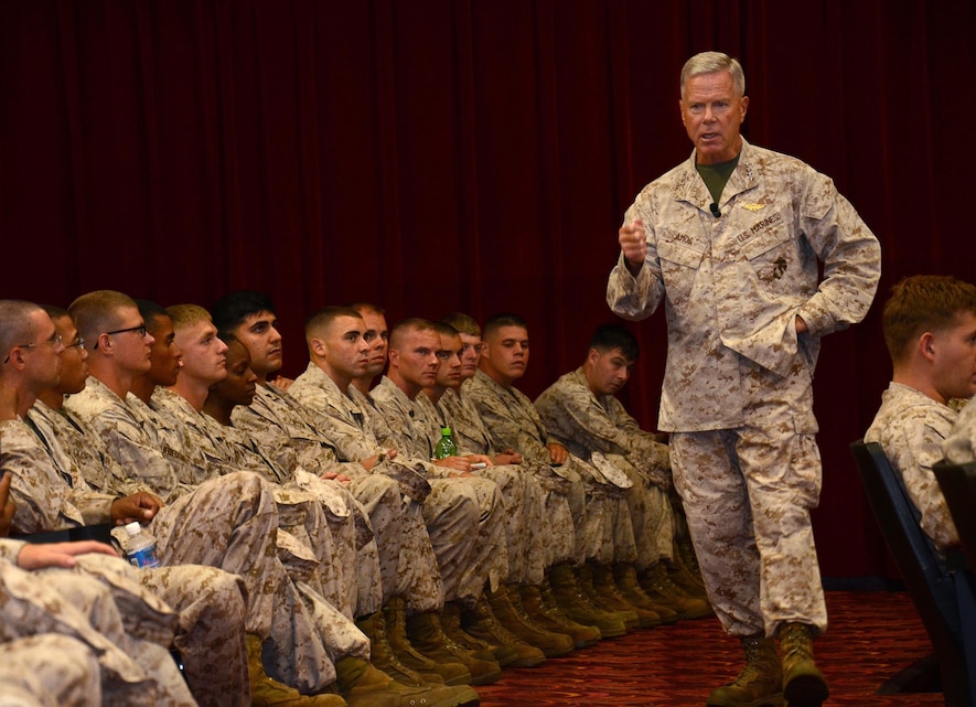 Gen. James F. Amos, Commandant of the Marine Corps, addresses Marines at the base theater, July 15, 2013. Amos and Sgt. Maj. Micheal P. Barrett, sergeant major of the Marine Corps, both visited Marine Corps Base Hawaii to discuss issues circulating within the Marine Corps. (U.S. Marine Corps photo by Lance Cpl. Nathan Knapke)