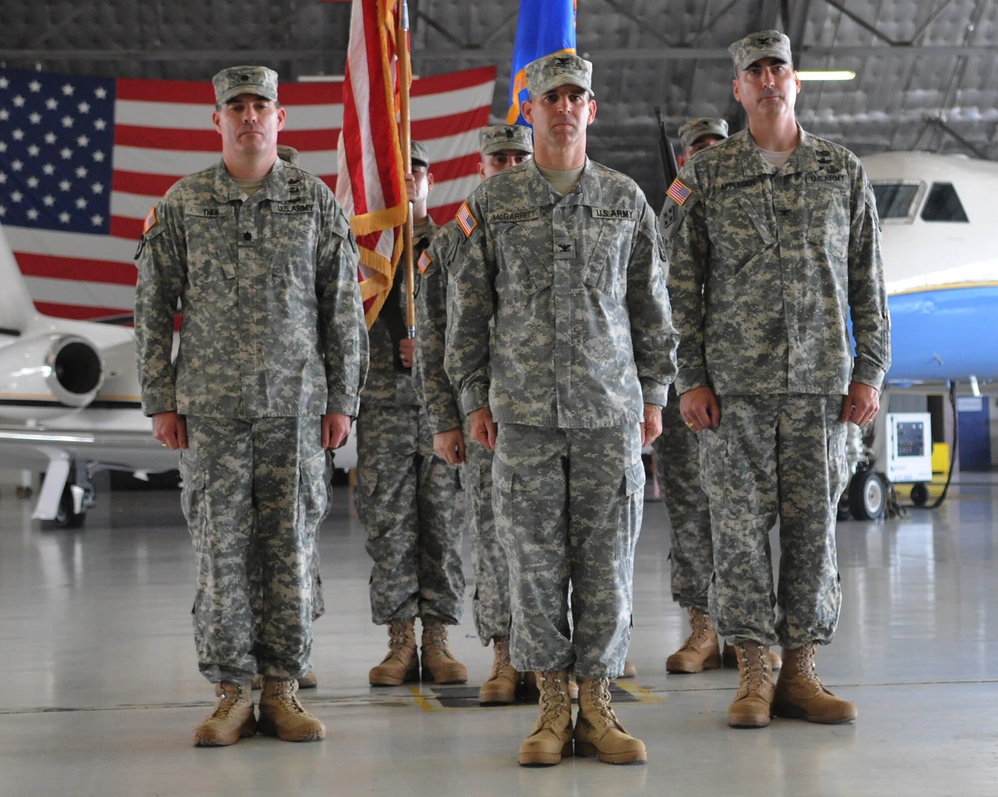 The United States Army Priority Air Transport Command leadership finishes passing the flag during their change of command ceremony at Joint Base Andrews, Md., July 19, 2013. The command’s mission is to provide senior Army leadership and key government officials with fast, long-range and professional executive transportation throughout the world. (U.S. Air Force photo/Airman 1st Class Nesha Humes)
