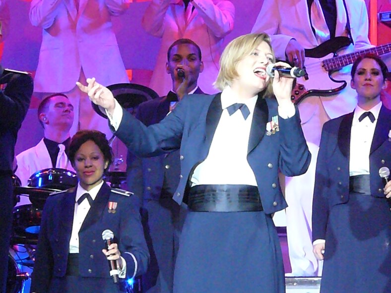 Senior Airman Joleen Dedmon, 944th Medical Squadron dental assistant, belts out the last song during a Tops in Blue performance in Phoenix June 5, 2012. Dedmon just completed her yearlong tour with the group. (U.S. Air Force photo/Maj. Elizabeth Magnusson)