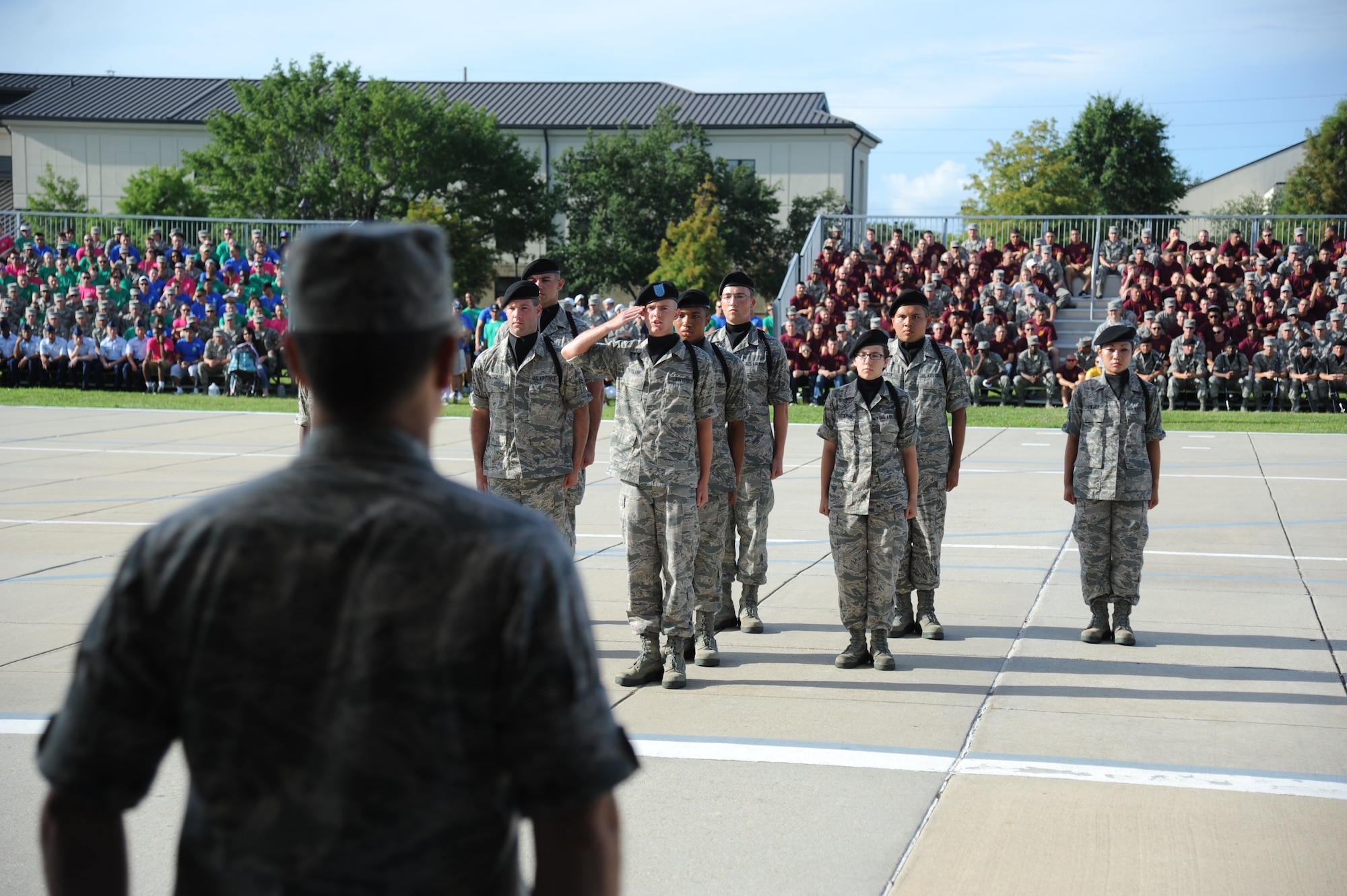 The 336th Training Squadron regulation drill master asks for permission to enter the field of regulation from Col. George Tombe, 81st Training Group commander, during the 81st TRG drill down competition July 19, 2013, behind the Levitow Training Support Facility, Keesler Air Force Base, Miss.  Col. George Tombe, 81st Training Group commander was the presiding officer for the event.  (U.S. Air Force photo by Kemberly Groue)