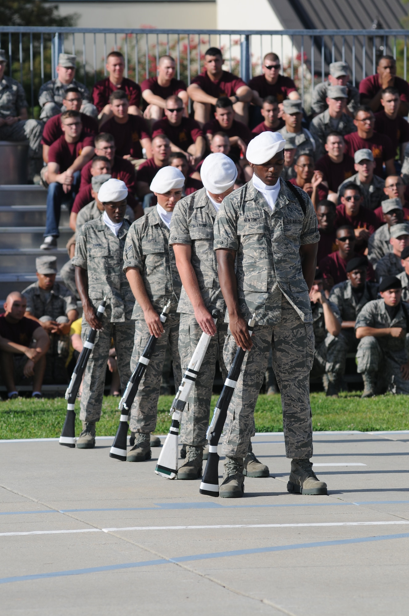 Members of the 334th Training Squadron perform during the freestyle portion of the 81st Training Group drill down competition July 19, 2013, behind the Levitow Training Support Facility, Keesler Air Force Base, Miss.  The 334th TRS won third place in every category to include open ranks, regulation, freestyle and overall.  (U.S. Air Force photo by Kemberly Groue)