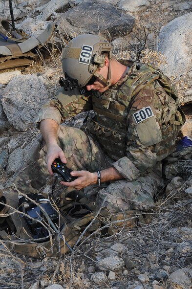 Senior Airman William Riddle, 56th CES EOD technician, controls an EOD robot simulating the disarming of an IED during training. (U.S. Air Force photo/Airman 1st Class James Hensley)