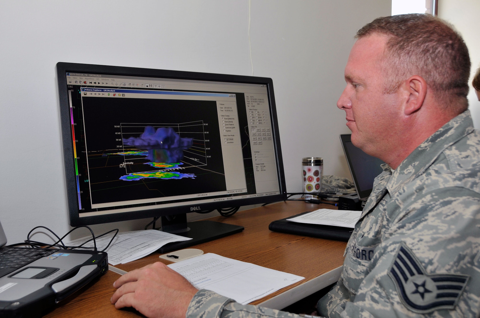 Air Force Staff Sgt. Brad Simon, Indiana Air National Guard, 181st Intelligence Wing, 113th Weather Flight forecaster on duty, analyzes weather conditions during annual training July 16, 2013, at the Combat Readiness Training Center, Alpena, Mich. (Air National Guard photo by Senior Master Sgt. John S. Chapman)