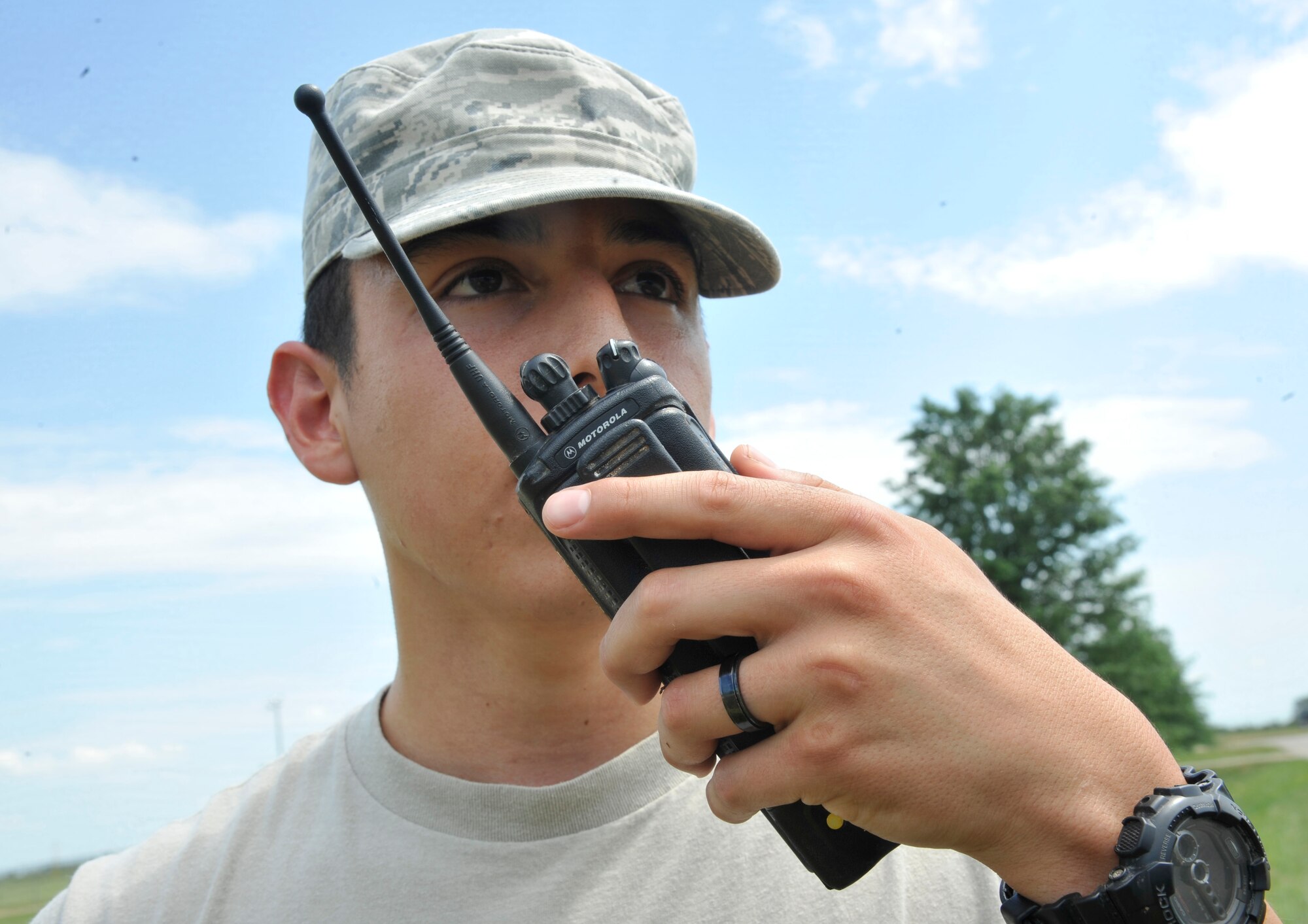 Airman 1st Class Edward Miramontes, 509th Civil Engineer Squadron water fuels maintenance  journeyman, calls in hydrant flow test numbers at Whiteman Air Force Base, Mo.,  June 9, 2013. Hydrant flow test numbers verify if the hydrant’s pressure is sufficient enough for the water distribution system. (U.S. Air Force photo by Airman 1st Class Keenan Berry/Released)
