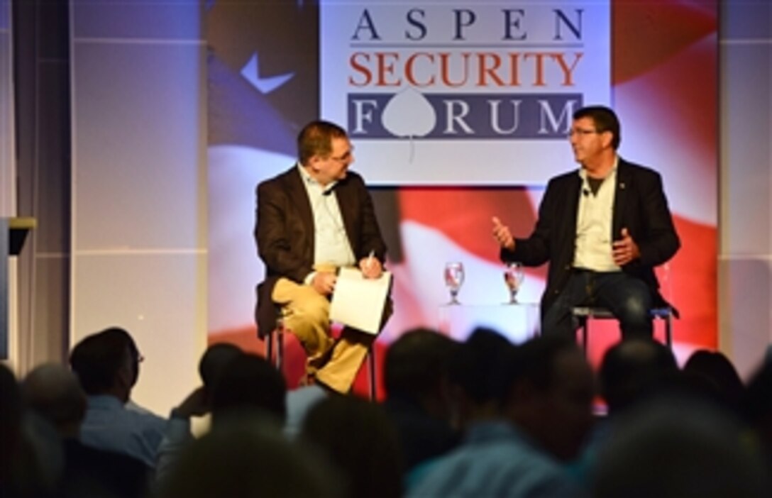Deputy Secretary of Defense Ashton B. Carter, right, speaks with David Sanger, chief Washington correspondent for The New York Times, during a question and answer period at the annual Aspen Institute Security Forum in Aspen, Colo., on July 18, 2013.  