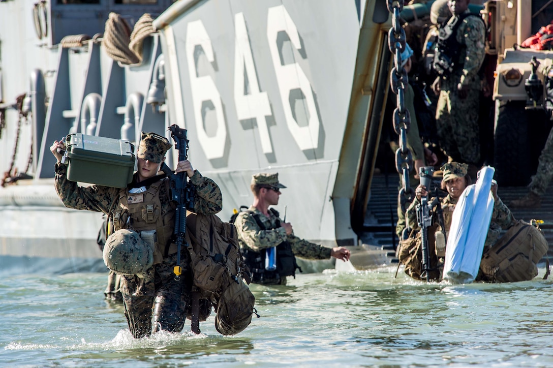 Following the assault of the 31st Marine Expeditionary Unit's Battalion Landing Team 2nd Battalion, 4th Marines, Marines of Combat Logistics Battalion 31, 31st MEU move ashore to support future training operations here, July 20. The Marines and Sailors of the 31st MEU and Amphibious Squadron 11 are part of an integrated force of approximately 18,000 U.S. service members training alongside approximately 9,000 Australian service members in the fifth iteration of Talisman Saber 2013, a month-long biennial exercise designed to enhance multilateral collaboration in support of future combined operations, natural disaster, humanitarian and emergency response. The 31st MEU is the Marine Corps’ force in readiness for the Asia Pacific region and the only continuously forward-deployed MEU. 