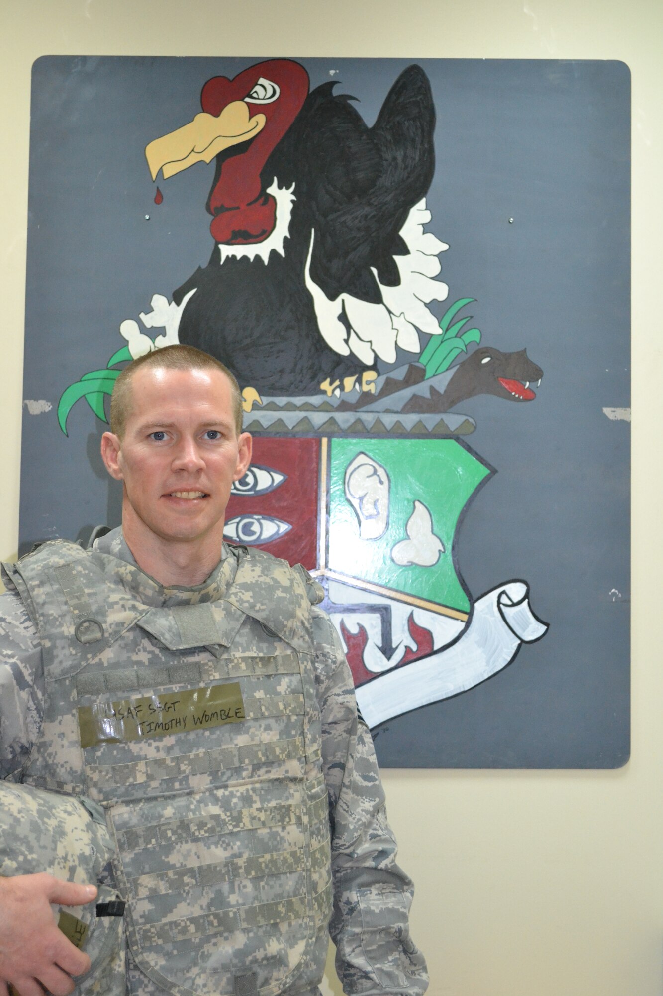 Staff Sgt. Timothy Womble is a quality assurance inspector and technical orders distribution official for the 386th Expeditionary Maintenance Group at an undisclosed location in Southwest Asia.  Womble is deployed from Joint Base Charleston, S.C. and is using his off-time to get involved with the base and take college classes.  He has been selected as his unit's Rock Solid Warrior.  (Courtesy photo)