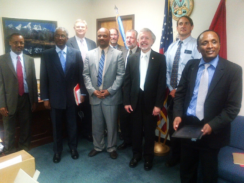 Standing from left to right are Mr Solomon Mekonnen (Ethiopian Embassy), Dr. Tesfaye Kebede Feyissa (WWDSE), Joe Manous (IWR), His Excellency Mr. Hailemeskel Tefera Hailemarkos (Minister of State, Ethiopian Urban Development & Construction Ministry), Will Logan (IWR), Andy Bruzewicz (IWR), Bob Pietrowsky (IWR), Hal Cardwell (IWR), and Dr. Negede Abate Kassa (WWDSE).