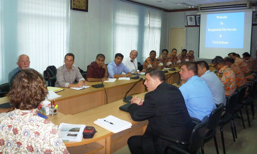 Debris stakeholders from the United States and Bangladesh meet with Fire Service & Civil Defense officers to discuss priority debris clearance routes in Dhaka City.