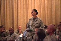 Sgt. Maj. Tamara L. Fode addresses Marine Corps leaders of commands across Okinawa during the 2013 Sexual Assault Prevention and Response Leadership Summit July 15 at the Butler Officers’ Club. The summit focused on how commanders and senior enlisted advisors should foster a positive command climate to combat sexual assault. Fode is the sergeant major of 3rd Marine Logistics Group, III Marine Expeditionary Force.