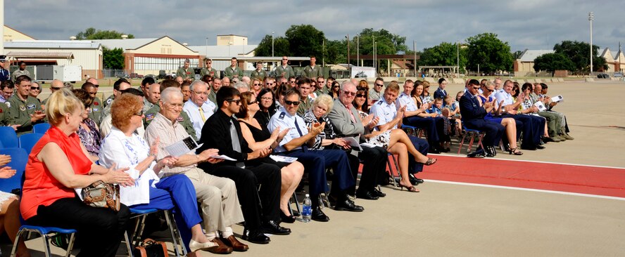 The family and friends of the crew of RAIDR 21 attended a remembrance ceremony in honor of their loved ones on Barksdale Air Force Base, La., July 21, 2013. The members of Team Barksdale held the ceremony to honor the lost Airmen and the families they left behind. (U.S. Air Force photo/Airman 1st Class Andrew Moua)