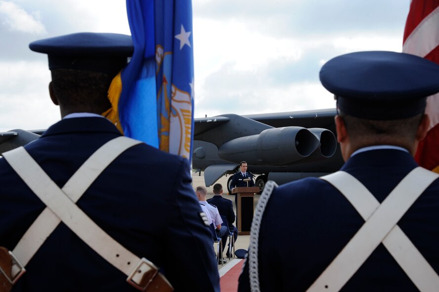 Maj. Patrick Raring, center, 96th Bomb Squadron, narrates during the remembrance ceremony of the RAIDR 21 crewmembers on Barksdale Air Force Base, La., July 21, 2013. Five years ago, six crewmembers lost their lives en route to a celebratory demonstration of Guam's liberation from Imperial Japanese forces during World War II. (U.S. Air Force photo/Airman 1st Class Andrew Moua)