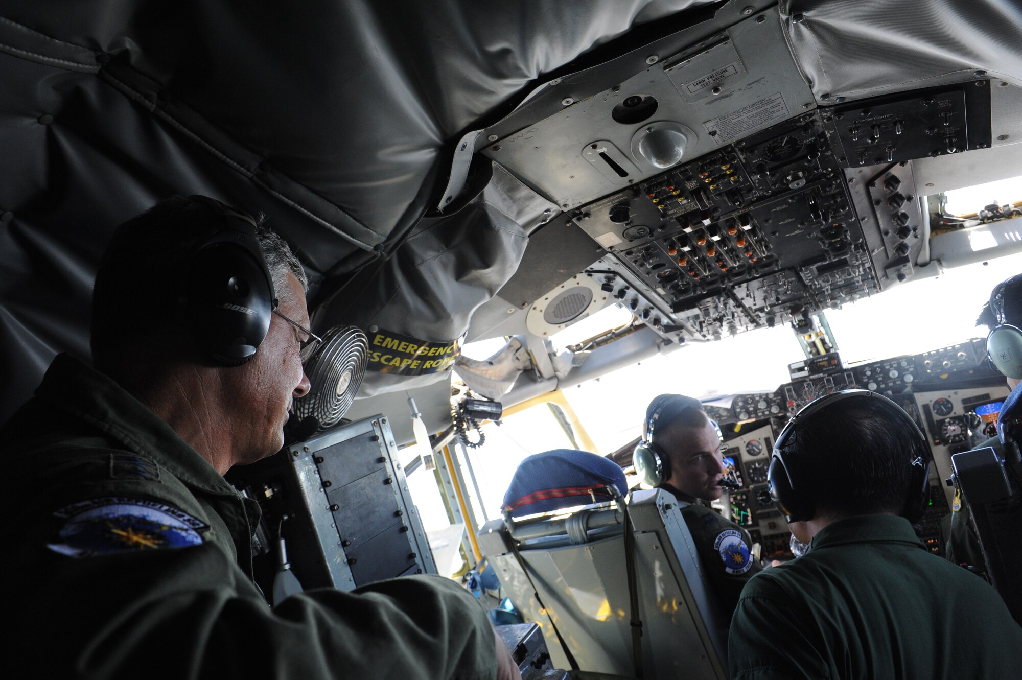 U.S. Air Force Lt. Gen. Sam Angelella, U.S. Forces Japan and 5th Air Force commander, watches as Lt. Gen. Yoshiyuki Sugiyama, Japan Air Self Defense Force Southwestern Composite Air Division commander, receives information about a KC-135 Stratotanker during a joint refueling mission with JASDF F-15J jets over the Pacific Ocean, July 11, 2013. The 909th Air Refueling Squadron conducted a bilateral refueling mission with JASDF F-15J jets to help prepare them for an upcoming training exercise, Red Flag Alaska. The mission also gave both services the opportunity to work together in an operational environment which allowed them to adapt to the subtle differences in terminology and language. (U.S. Air Force photo by Airman 1st Class Malia Jenkins/Released)   