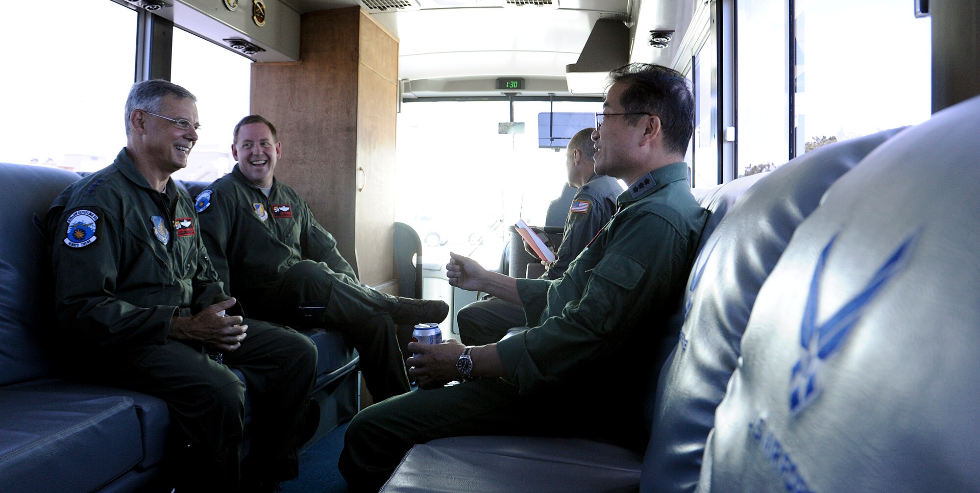 U.S. Air Force Lt. Gen. Sam Angelella, U.S. Forces Japan and 5th Air Force commander, Brig. Gen. James Hecker, 18th Wing commander, and Lt. Gen. Yoshiyuki Sugiyama, Japan Air Self Defense Force Southwestern Composite Air Division commander, ride out to a KC-135 Stratotanker on Kadena Air Base, Japan, July 11, 2013. The 909th Air Refueling Squadron conducted a bilateral refueling mission with JASDF F-15J jets to help prepare them for an upcoming training exercise, Red Flag Alaska. The mission also gave both services the opportunity to work together in an operational environment which allowed them to adapt to the subtle differences in terminology and language. (U.S. Air Force photo by Airman 1st Class Malia Jenkins/Released)  