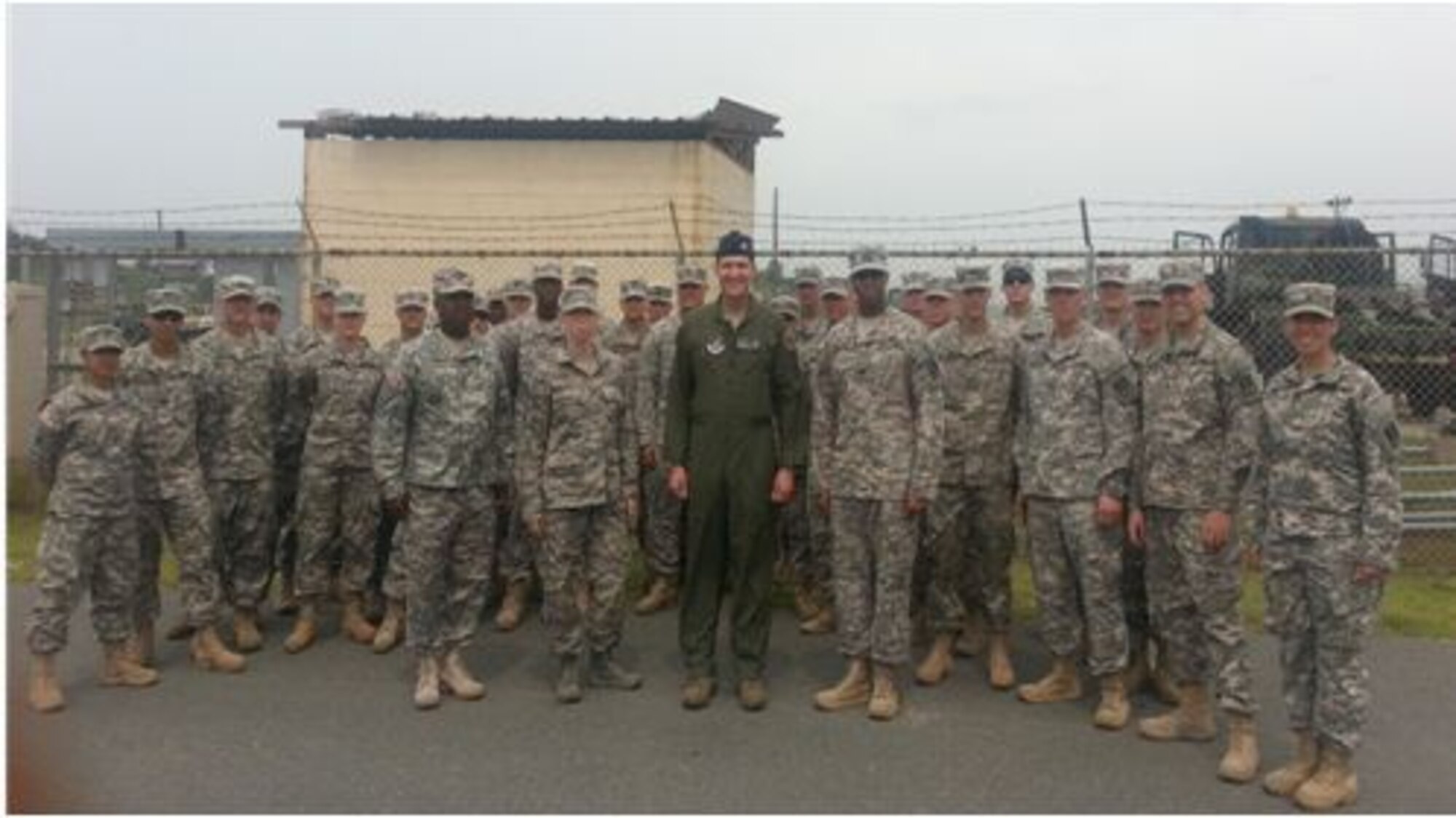 KUNSAN AIR BASE, Republic of Korea --Colonel S. Clinton Hinote, 8th Fighter Wing commander, center, and Chief Master Sgt. Rhonda Miller,8th FW command chief, center left, toured  the Alpha Battery, 2nd Battalion, 1st Air Defense Artillery Regiment Patriot Missile Site, at Kunsan Air Base, Republic of Korea, July 2, 2013. Kunsan leadership wanted to learn more about Alpha Battery’s mission and strengthen the Soldier and Airmen bond. (U.S. Army courtesy photo)