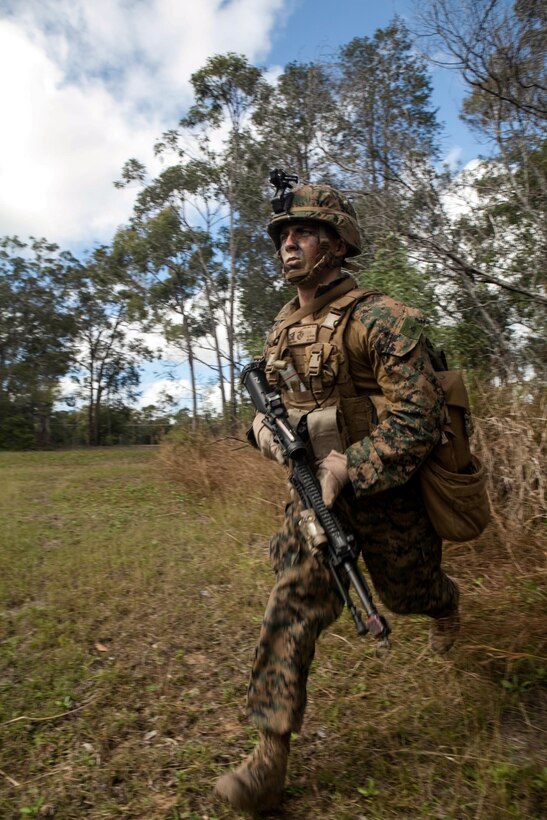 A Marine with Company E., Battalion Landing Team 2nd Battalion, 4th Marines, 31st Marine Expeditionary Unit, sprints out of the brush and through a danger area during an aerial assault as a part of Talisman Saber 2013, here, July 21. The Marines and Sailors of the 31st MEU and Amphibious Squadron 11 are part of an integrated force of approximately 18,000 U.S. service members training alongside approximately 9,000 Australian service members in the fifth iteration of Talisman Saber 2013, a month-long biennial exercise designed to enhance multilateral collaboration in support of future combined operations, natural disaster, humanitarian and emergency response. The 31st MEU is the Marine Corps’ force in readiness for the Asia Pacific region and the only continuously forward-deployed MEU. 