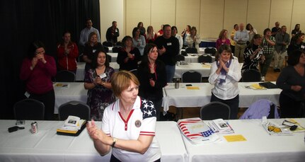 Wisconsin National Guard members and their families participate in the "Dancing in the Kitchen" workshop at the 2010 Wisconsin National Guard Family Program Conference. This workshop is designed to help busy people lead healthier lives.