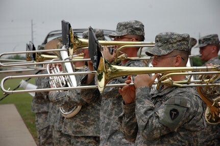 Division band performs at Camp Mabry, just one of the many events they attend. The award winning band receives enough requests to drill every weekend throughout the year.