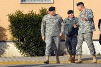 Maj. Gen. William B. Garrett III, commander of U.S. Army Africa (right), Lt. Gen. Clyde Vaughn, director of the Army National Guard (center) and Lt. Gen. Jack Stultz, Chief, U.S. Army Reserve and Commanding General, U.S. Army Reserve Command (left) walk before a meeting at U.S. Army Africa headquarters on Feb. 11, 2009. The focus of the meeting was to discuss the role of U.S. Army Reserve Soldiers in future missions to Africa.