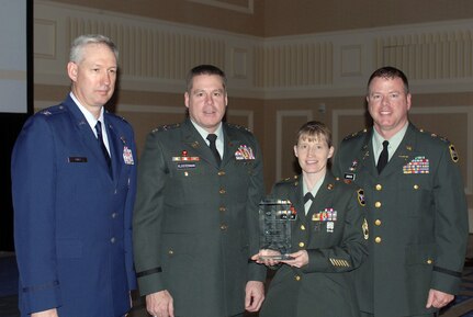 From left to right: Col. William Carle, chief of the National Guard Bureau's counter drug office; Lt. Col. Jeffrey Klosterman, South Dakota Counter Drug Coordinator; Sgt. 1st Class Kristi Palmer, DDR NCOIC; Capt. Don Johnson, DDR Administrator. The South Dakota National Guard recently received the national award for outstanding DDR program of the year at the annual Community Alcohol and Drug Coalitions of America National Leadership Forum Award luncheon.