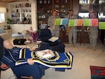 The "Darn Saxy" quartet of the New Mexico Army National Guard's 44th Army Band recently held a priviate concert for retired Col. Frank Hines, an 81-year-old Vietnam veteran, who served in both the Navy and the Air Force during his long military career.