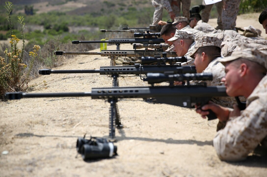 Marines serving with 1st Light Armored Reconnaissance Battalion practice aiming the M107 Special Application Scoped Rifle during a weeklong SASR training course here, July 9, 2013. Upon completion of the course, they will train their fellow Marines on the employment of the rifle.