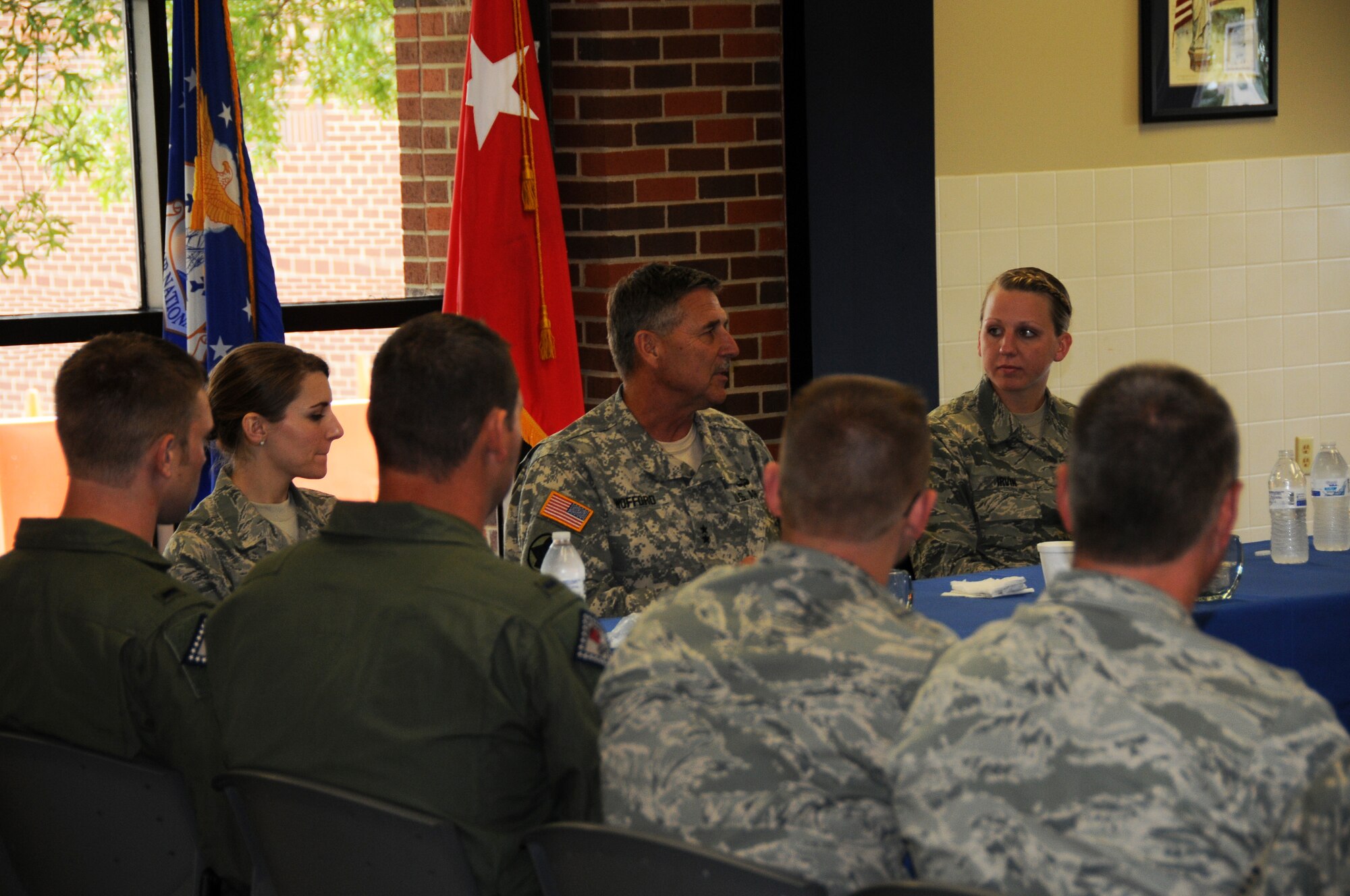 Maj. Gen. William Wofford, Arkansas National Guard adjutant general, visits with members of the 188th Fighter Wing July 15 during a command visit to the unit. (U.S. Air National Guard photo by Senior Airman John Hillier/188th Fighter Wing Public Affairs)